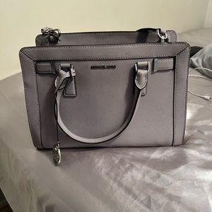 Purple Michael Kors purse.